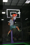 Guy Dunking a Basketball